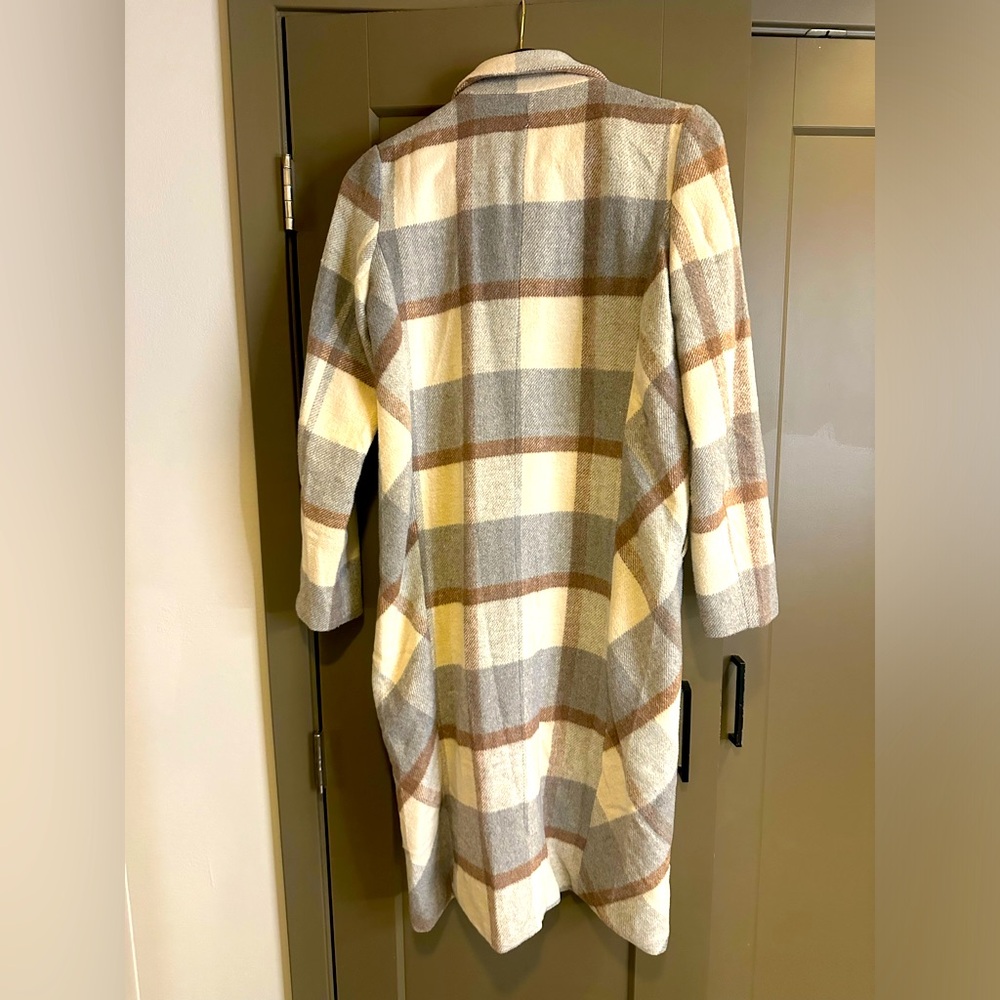Long, plaid jacket.